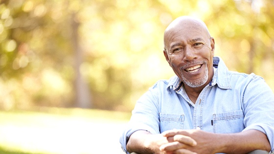 Man with All-On-4 dental implants in Thorndale smiling