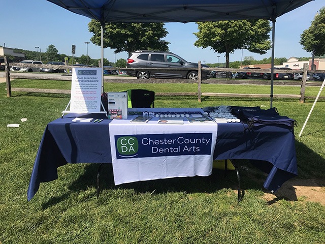 Chester County Dental Arts booth at community event