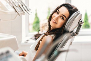 Smiling woman in dental chair