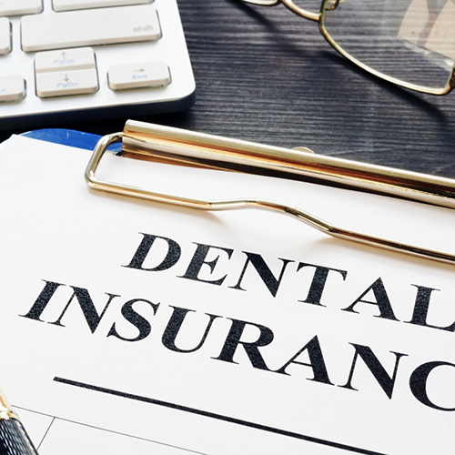 Close up of dental insurance form on clipboard