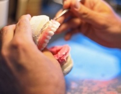 Woman with beautiful smile after full mouth reconstruction