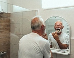 Man brushing teeth in Thorndale