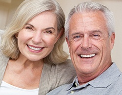 Couple with dental implants in Thorndale