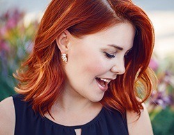 Young woman with dental implants in Thorndale