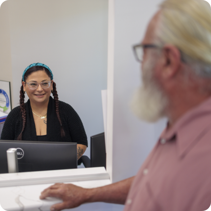 Patient checking in at the front desk