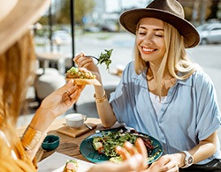 Two women eating lunch together