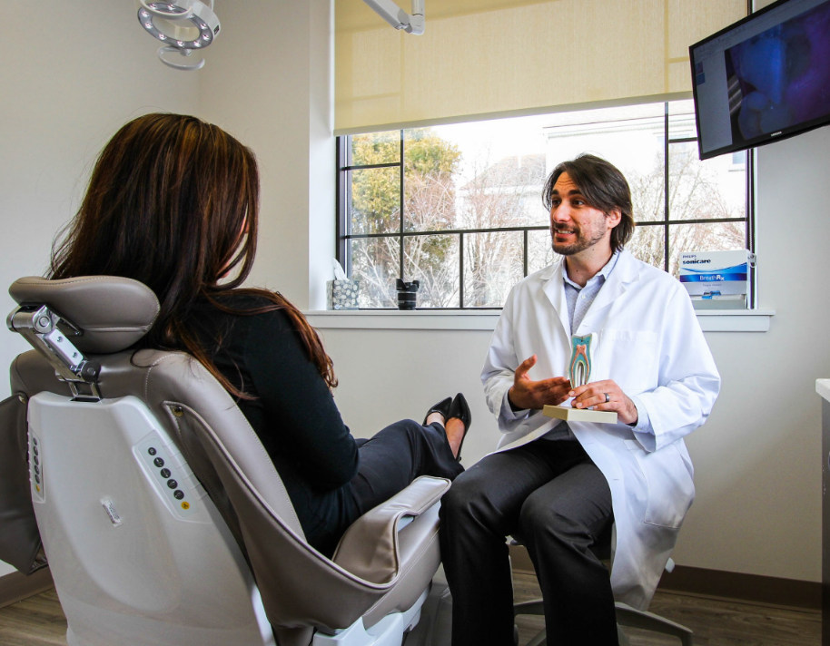 Dr. Simeone with a patient at Chester County Dental Arts