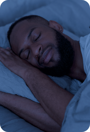 Man sleeping soundly thanks to sleep apnea therapy