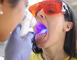 Patient receiving oral cancer screening