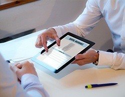 Dental insurance forms on tablet computer