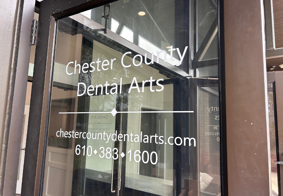 Close up of practice logo on front door