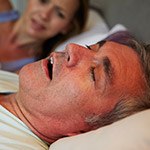 Wife sleepless due to husband snoring before sleep apnea treatment