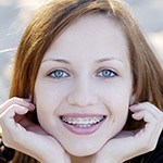 Woman wearing traditional braces