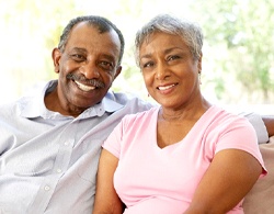 Couple with Teeth-In-A-Day dental implants in Coatesville