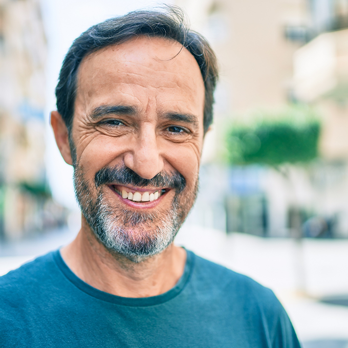 Close up of bearded man smiling
