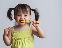 kid brushing teeth