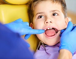 young boy visits dentist