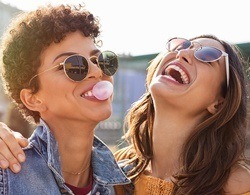 Couple having fun together after porcelain veneer treatment