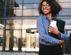 Business person with porcelain veneers smiling