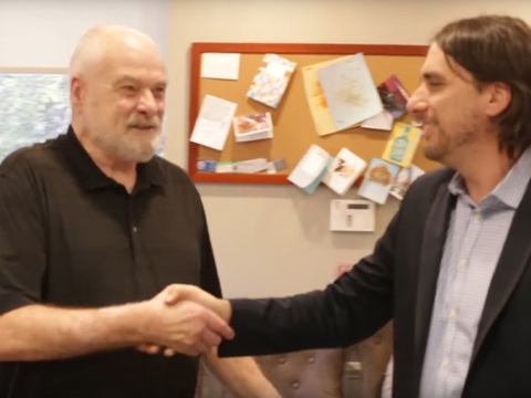 Coatesville dentist shaking hands with a patient