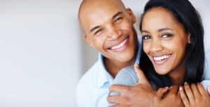 couple smiling, straight smiles, Invisalign