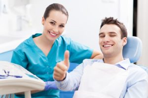 Happy man at dentist
