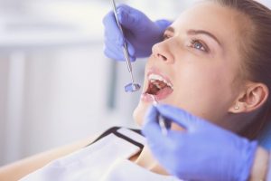 a woman in the dentist chair