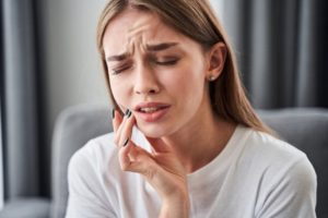 a patient suffering from a severe toothache