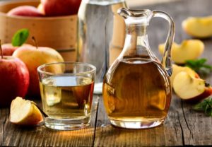 a glass of apple cider vinegar